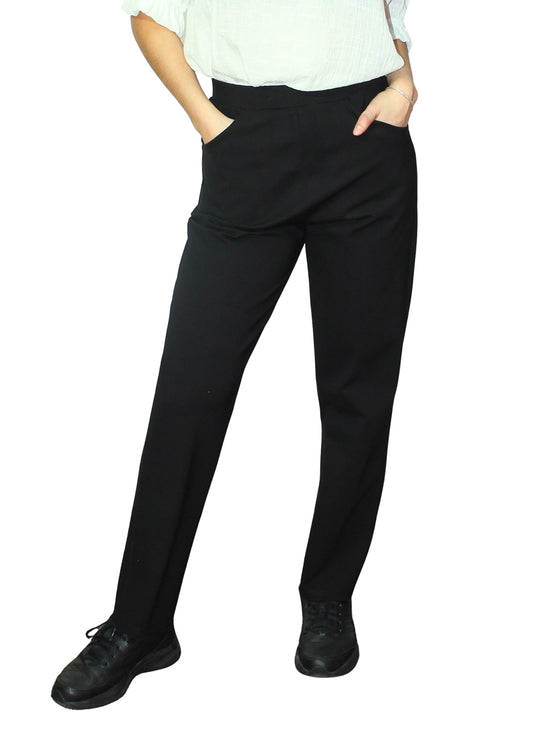 Person wearing black pants on a white background