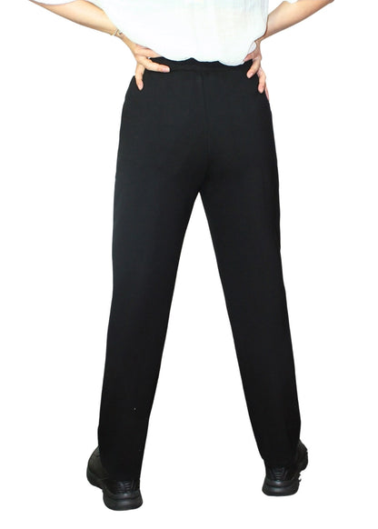 Person wearing black pants on a white background