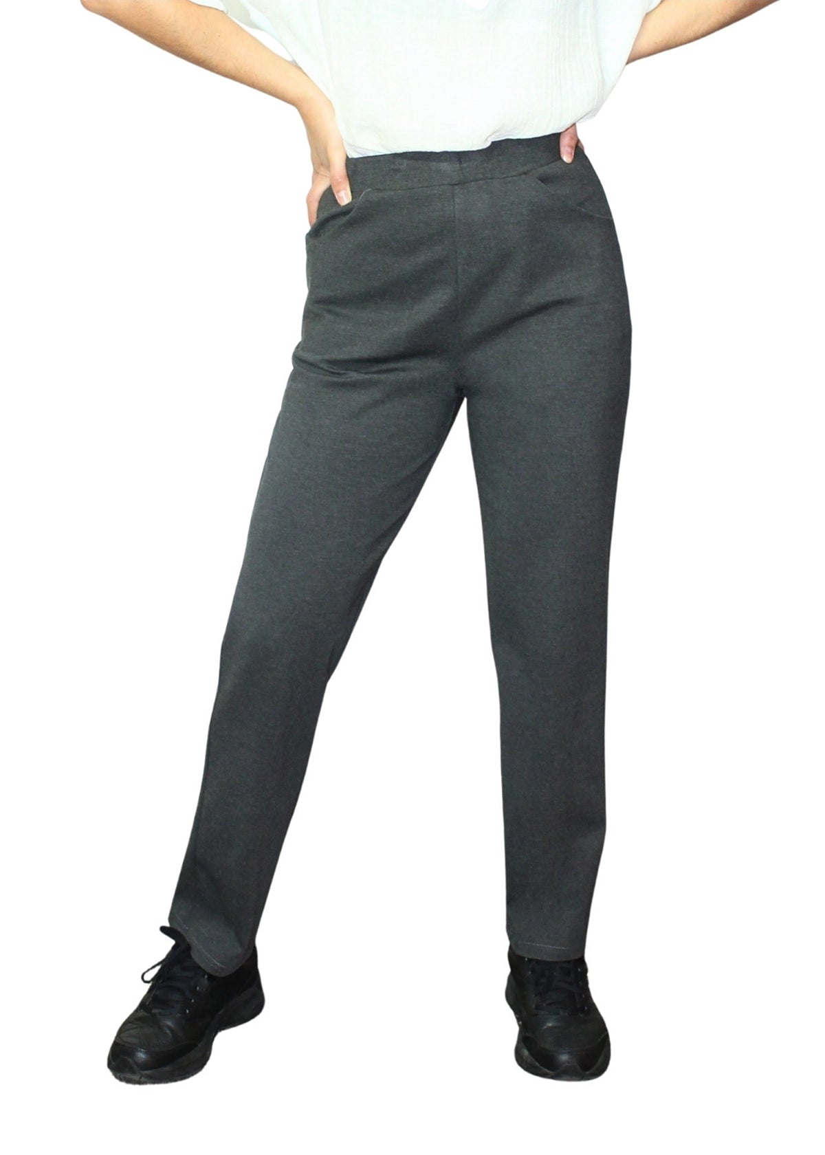 Person wearing gray pants on a white background