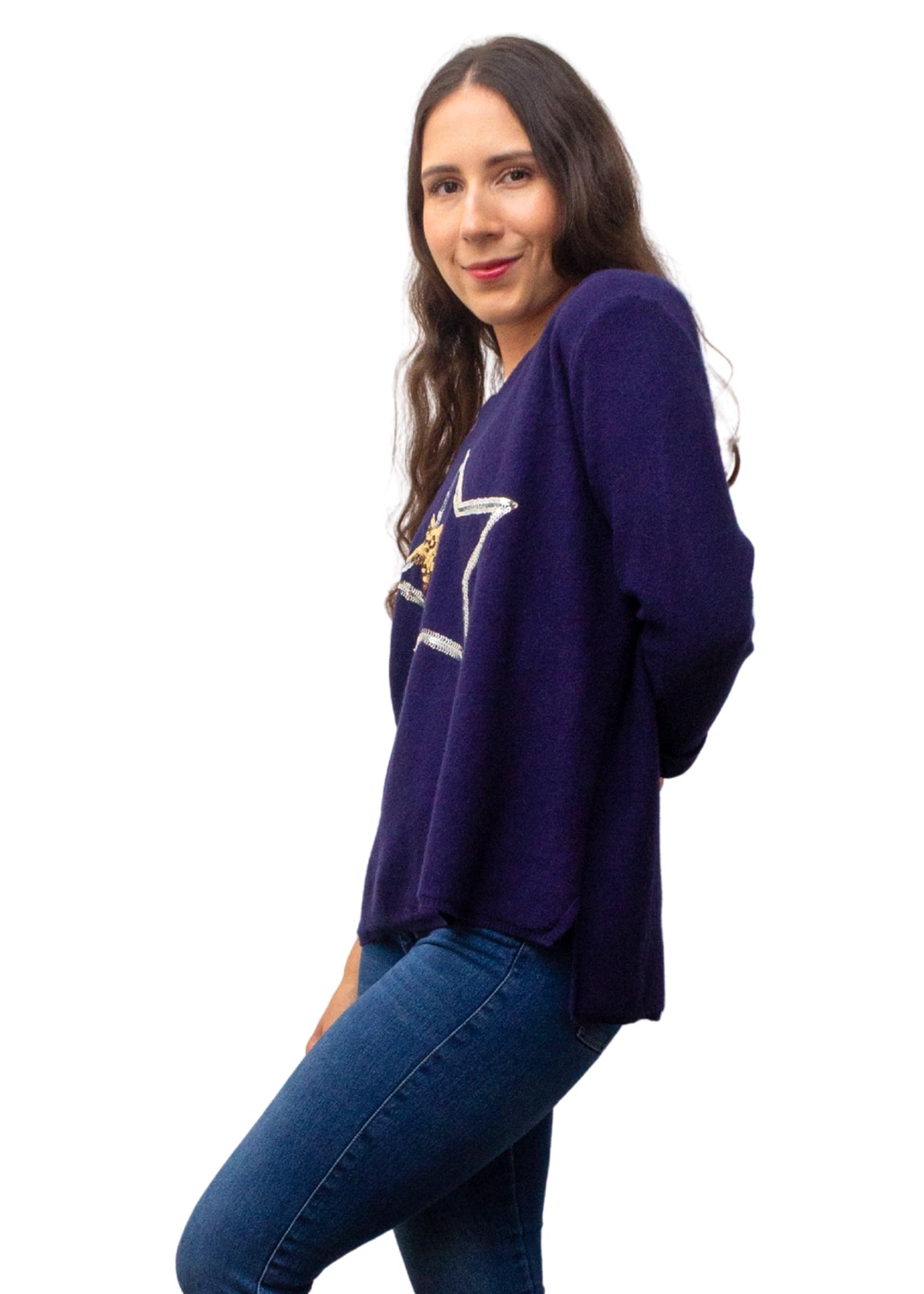 Woman wearing a purple sweater with a logo on a white background