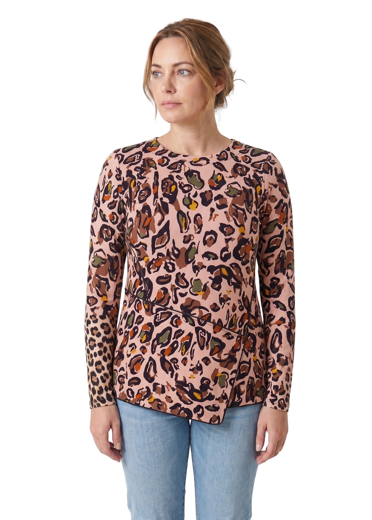 Woman wearing a leopard print sweater on a white background