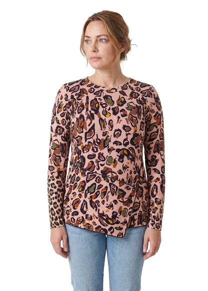 Woman wearing a leopard print sweater on a white background