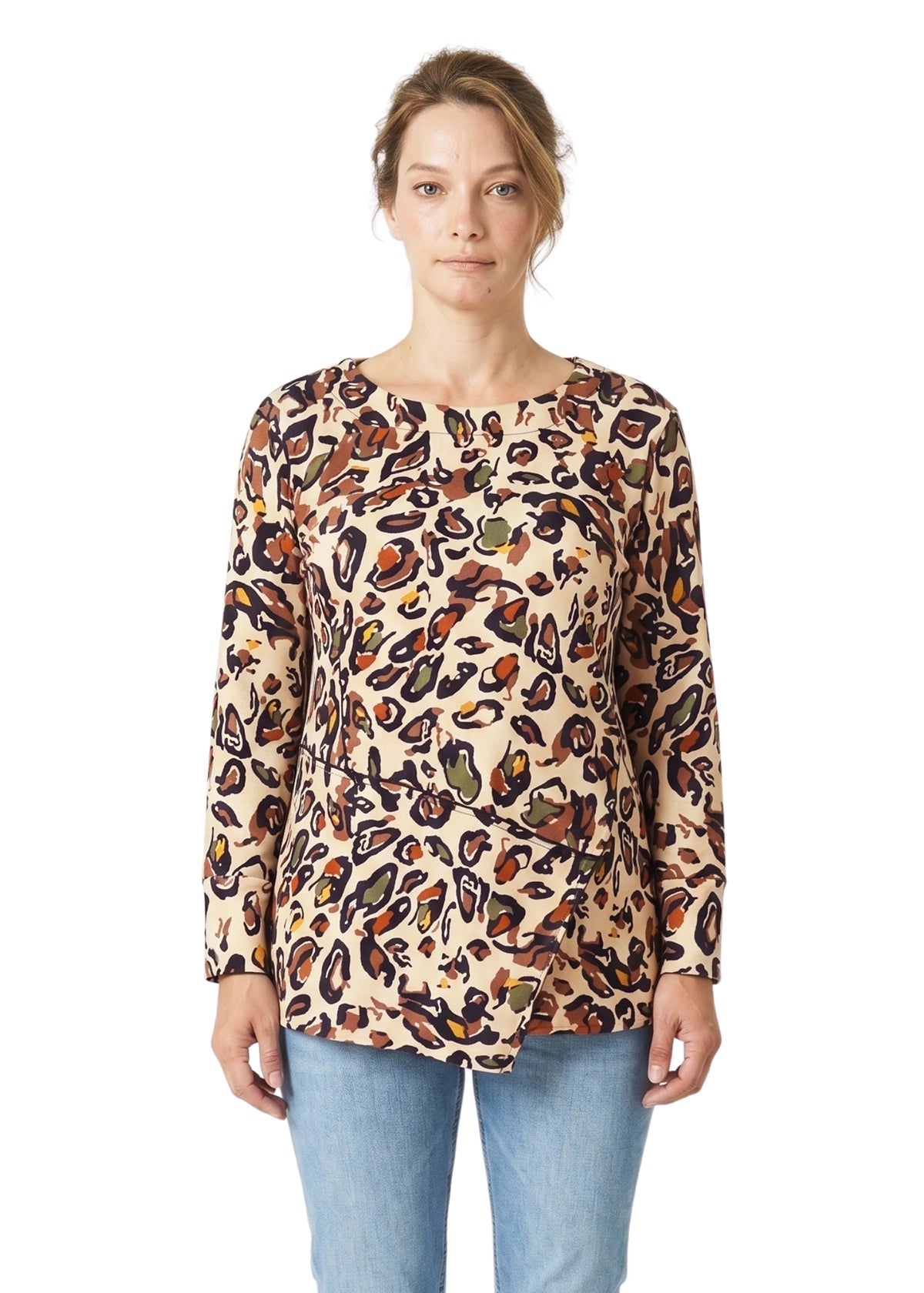 Woman wearing a long-sleeve top with a colorful pattern on a white background